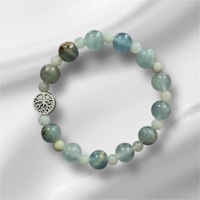 Bracelet Harmonie Céleste avec perles de calcite bleue et amazonite brute, décoré d’un arbre de vie argenté